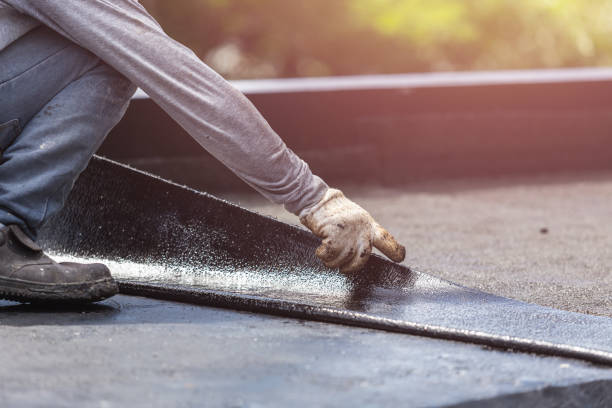 Professional Waterproofing technician working in Valley Center, KS